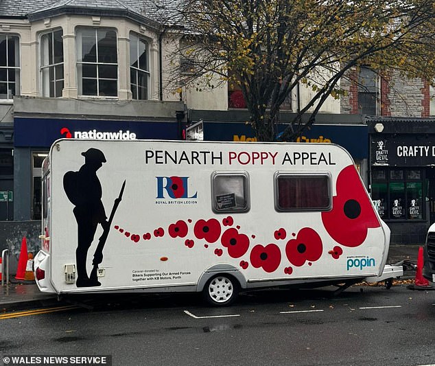 Royal British Legion volunteers are abused by ‘left-wing idiots’ as they put up poppies and Union Jack flag ahead of Remembrance Day