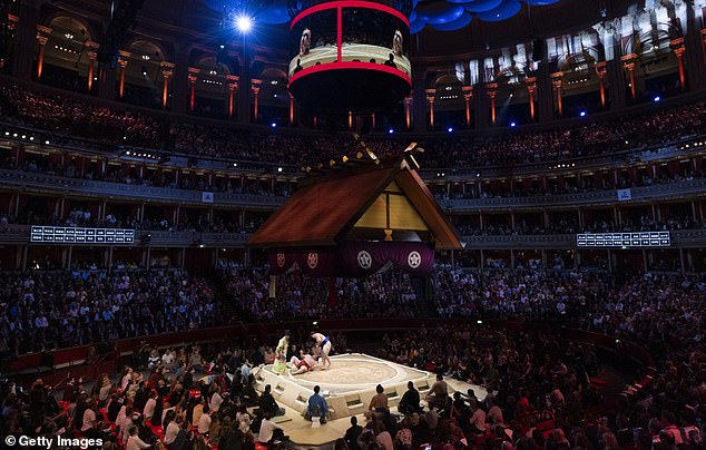 Sumo stars take over London: Sold-out crowd watches first night as 25 STONE fighters dazzle Royal Albert Hall – after drinking Guinness and visiting McDonald’s