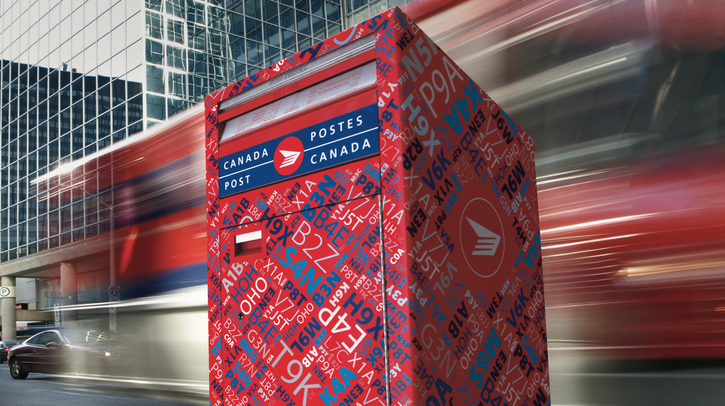 Canada Post reports largest ever pre-tax loss but agrees deal with union