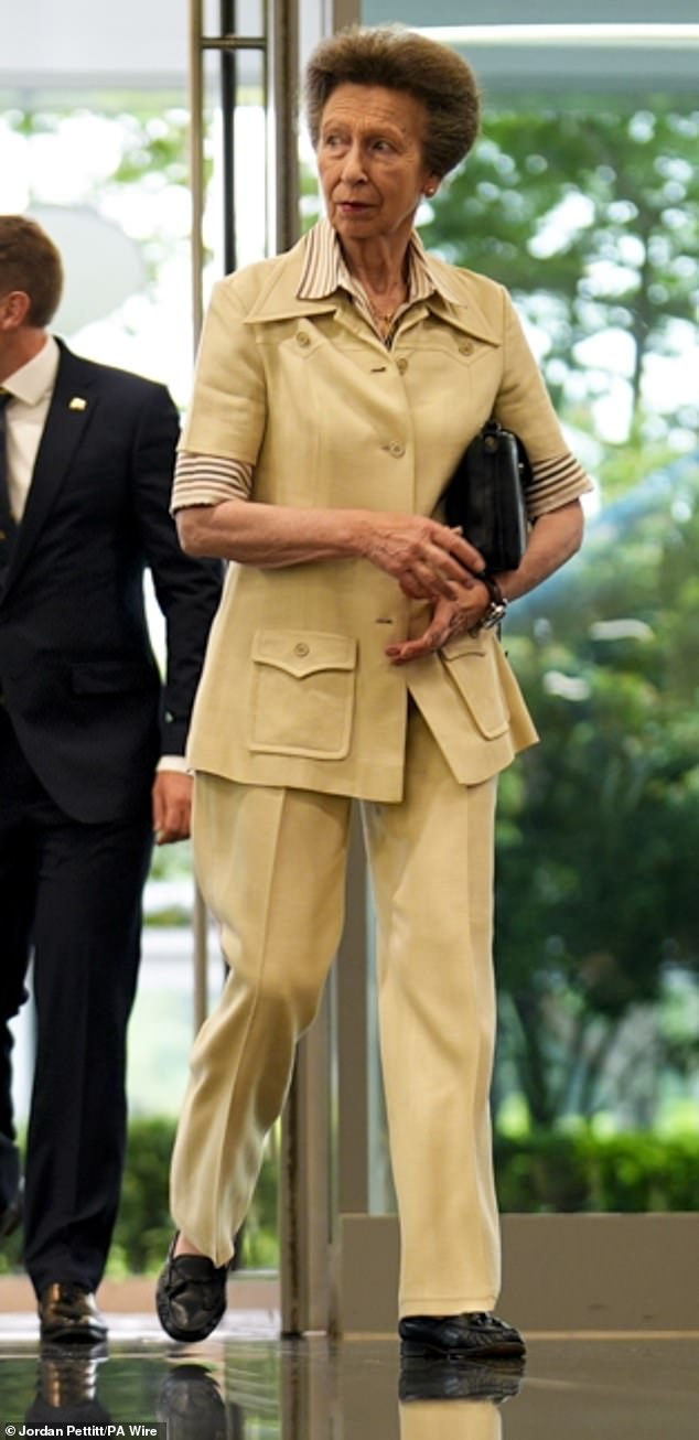 Princess Anne crowned ‘Queen of Thrift’ as she gives safari-style trouser suit a third outing in Singapore… 52 years after it made its debut