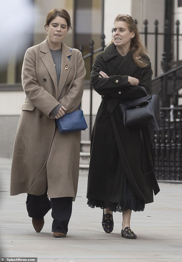 Princesses Beatrice and Eugenie share an emotional hug after intense conversation on a Mayfair street as disgraced father Andrew was officially stripped of his royal titles