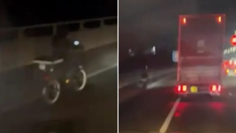 Watch moment delivery driver rides e-scooter down busy motorway as lorry spotted overtaking ‘idiot’ biker