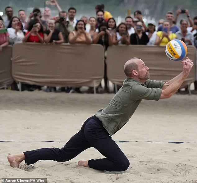 Wild about Wills! Prince is mobbed by VERY handsy Brazilian royal fans after setting pulses racing with his physique during beach volleyball
