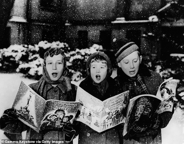 Which beloved Christmas carol is believed to contain a secret message calling for the overthrow of the Royal family?