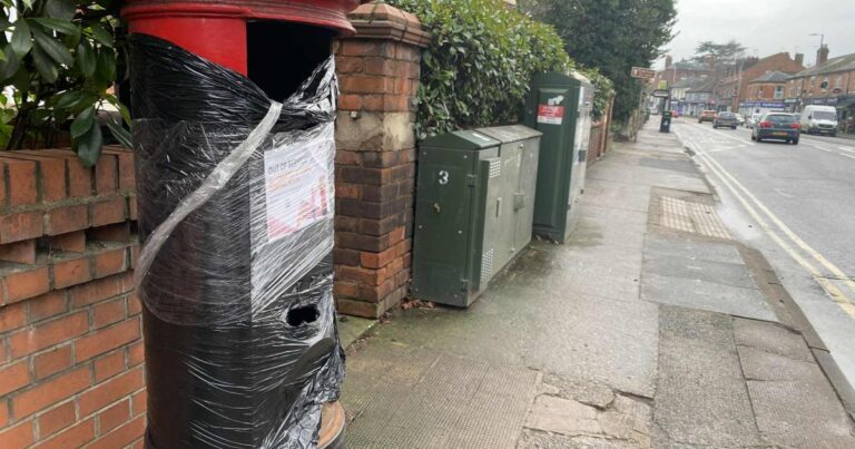 Why are post boxes in Worcester wrapped in black bags