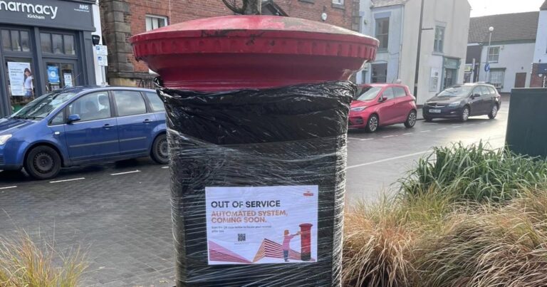 Why are postboxes in County Durham being covered by black bags?