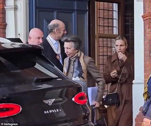 Zara Tindall finally joins Princess Anne for royal outing…as fans spot her munching on a biscuit