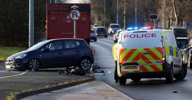 Pictures show aftermath of Royal Mail truck and car crash as police shut road